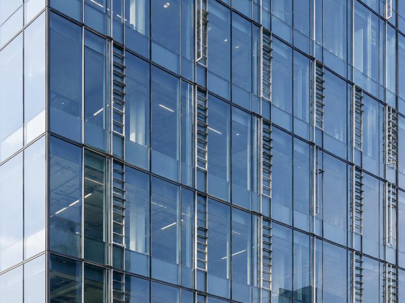 High-rise façade of repeating glass and aluminium panels